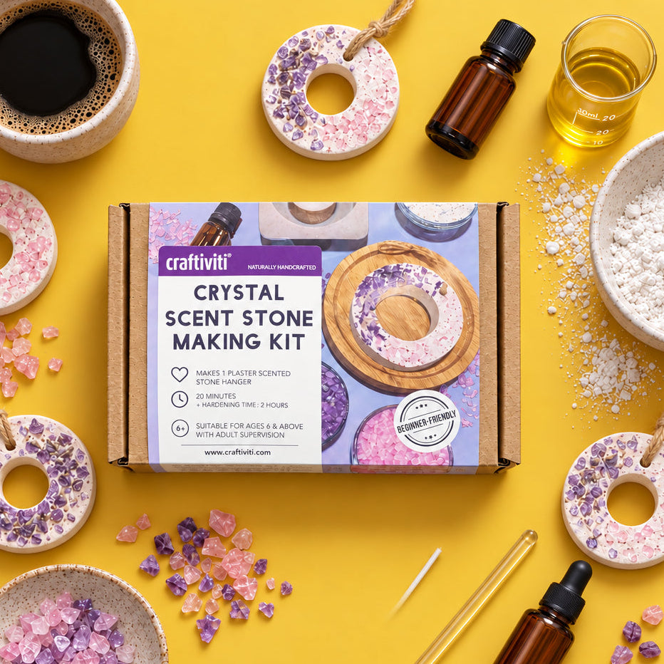 Craftiviti Crystal Scent Stone Making Kit in its original cardboard packaging, displayed on a gray wood-textured surface.