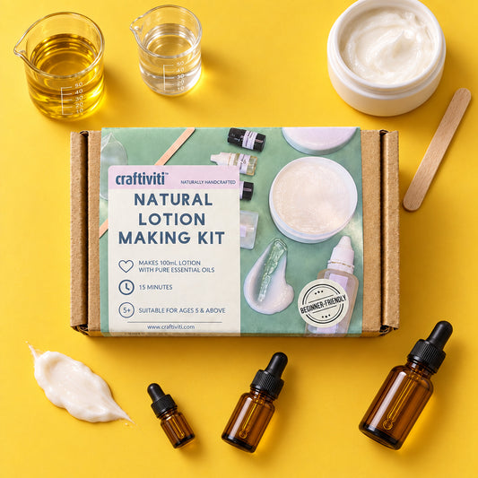 Craftiviti Natural Lotion Making Kit in a cardboard box with a mint green and white label, placed on a gray wood-grain surface.