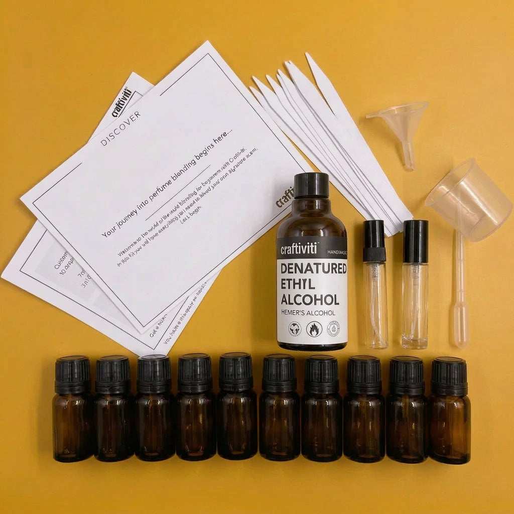 Craftiviti denatured ethanol alcohol kit with five amber bottles, two clear bottles with black caps, white tools, paper inserts, and a yellow background.
