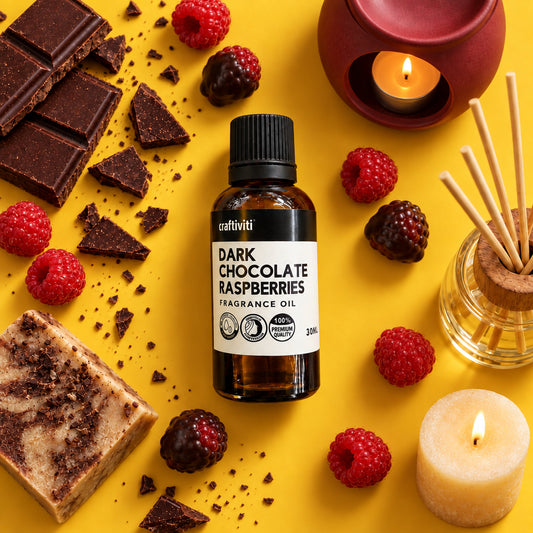 A bottle of Craftiviti Dark Chocolate Raspberry Fragrance Oil, 30ml, in an amber glass bottle with a black cap and white label, set against a textured gray concrete background.