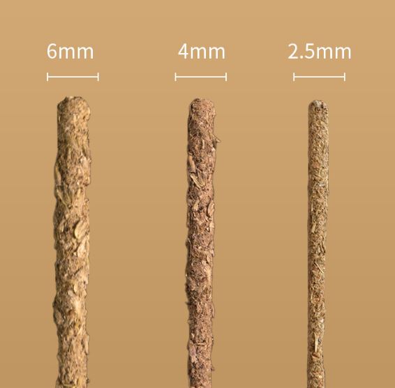 Three sticks of different sizes labeled with measurements on a beige background