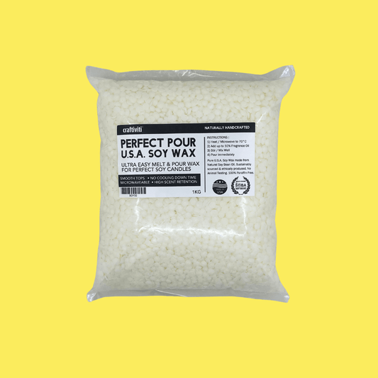 A clear plastic bag containing white soy wax pellets with a yellow background.