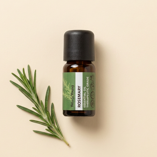 A 10ml bottle of Yein&Young Rosemary Essential Oil with a green label, brown bottle, and black cap.